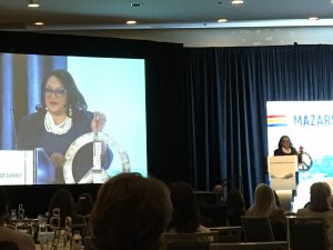Carla Reid, keynote speaker for the Women of Water Summit that occurred on Jan. 9 in Arlington, Va., shows attendees her vision board. Mariah Walters Orose/WEF